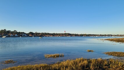 Le phare du Cap Ferret vu depuis la Flèche du Mimbeau à marée haute (presqu'île du Cap Ferret) © Arnaud