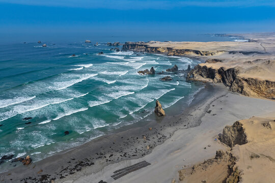 Aerial view of Marcona maritime bay by desert and cliffs