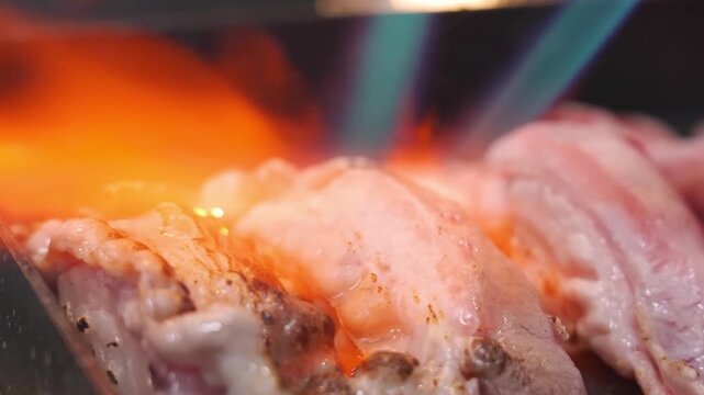 A detailed, macro shot of succulent, orange and white raw lobster meat, showing texture and moisture as it is prepared for a gourmet seafood dish.