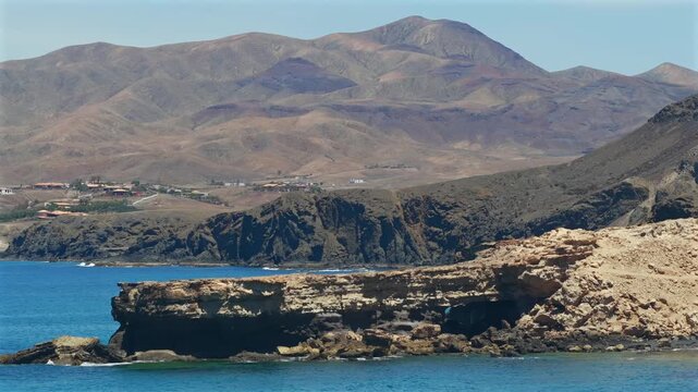 Aerial View of Beginners Catching Waves with a Surf School at Playa de Mal Nombre, Fuerteventura