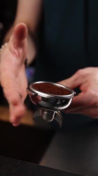 A professional bartender prepares fresh coffee in a stylish caf&eacute; atmosphere. Close-up details, steam, coffee aroma, and cinematic lighting create a cozy premium hospitality scene perfect for caf&eacute;s, re