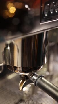 A professional bartender prepares fresh coffee in a stylish caf&eacute; atmosphere. Close-up details, steam, coffee aroma, and cinematic lighting create a cozy premium hospitality scene perfect for caf&eacute;s, re