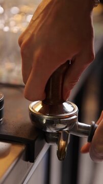 A professional bartender prepares fresh coffee in a stylish caf&eacute; atmosphere. Close-up details, steam, coffee aroma, and cinematic lighting create a cozy premium hospitality scene perfect for caf&eacute;s, re
