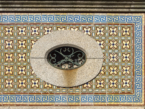 Traditional Portuguese azulejo tiled wall with window