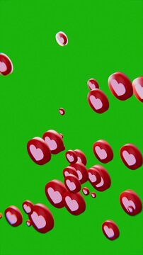 social media love heart like icons floating upwards, on green screen background