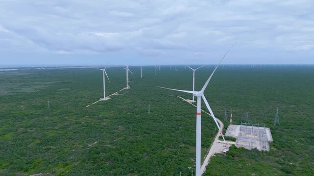 Aerial landscape shot captures a large wind farm generating renewable energy in the rural region between M&eacute;rida and Progreso, Mexico.