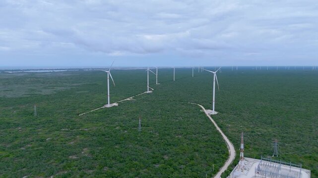 Aerial landscape shot captures a large wind farm generating renewable energy in the rural region between M&eacute;rida and Progreso, Mexico.