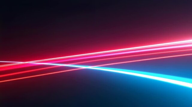 Vibrant streaks of red and blue light move dynamically across a dark background, creating an abstract representation of speed, energy, and modern technology.