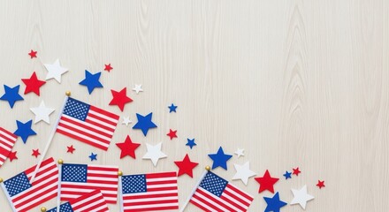 Fototapeta premium Colorful miniature American flags with stars scattered on light wooden surface background