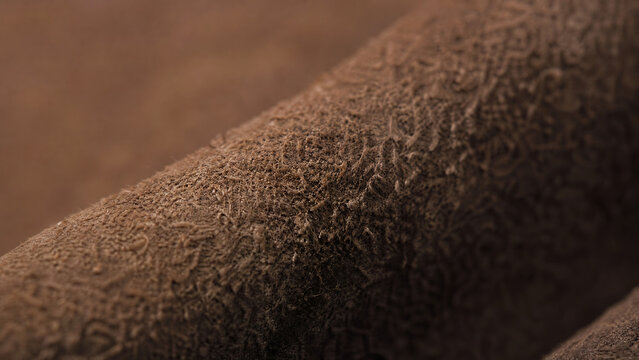Brown suede leather texture, soft macro fabric material background