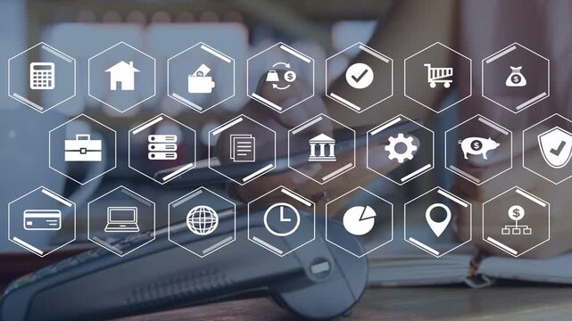 Office worker seeing hex icon grid appearing, reaching for phone and tapping while checking finance