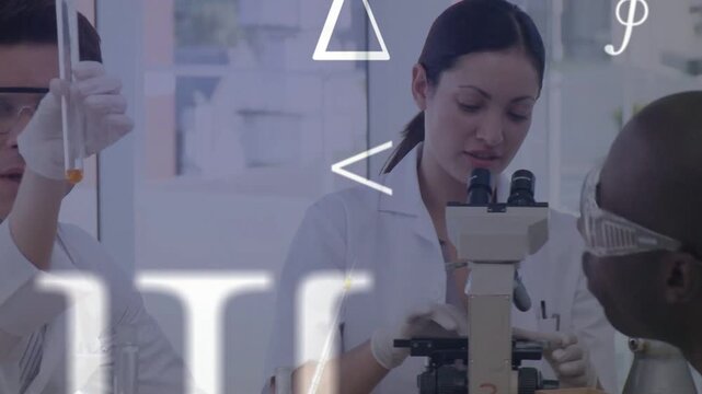 Lab team prepping samples at microscope after male lifting yellow flask, Greek symbols floating