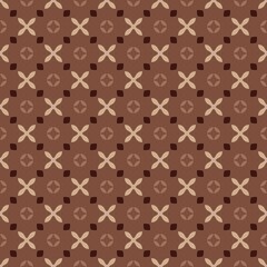 Fototapeta premium A brown and tan patterned background with a white and brown design. The design is made up of squares and triangles