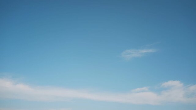 Beautiful blue sky with distant thin clouds and gradient