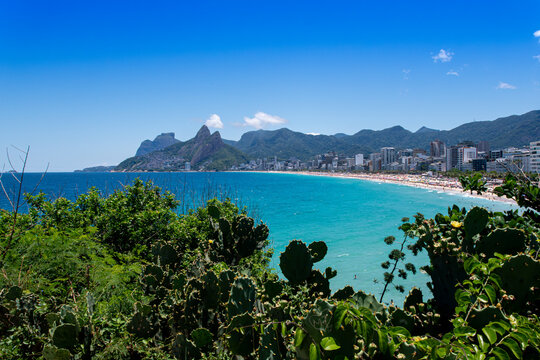 View from the Arpoador rock formation and vegetation overlooking the beautiful turquoise beaches of Rio de Janeiro - Brazil.