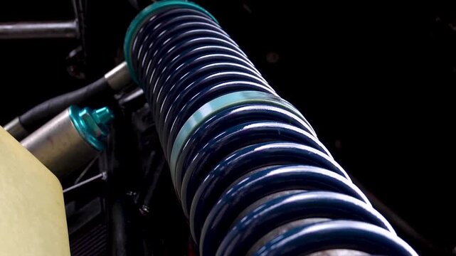 Close up of monster truck springs and chassis