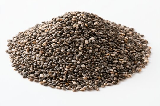 A heap of small, oval, black and white chia seeds on a white background.