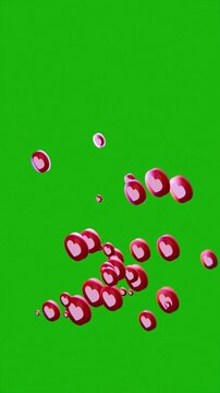 social media love heart like icons floating upwards, on green screen background