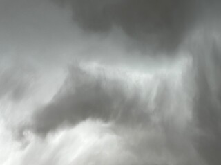 Fototapeta premium Rain storm clouds creating dramatic natural weather scene across open atmospheric sky