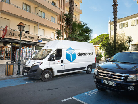 LE LAVANDOU, FRANCE - SEPTEMBER 30, 2025: Chronopost logo on a white delivery van parked in Le Lavandou, France, Chronopost is a French express parcel delivery service Part of La Poste Group.