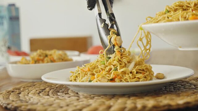 Traditional Indonesian mie goreng served with fried egg, vegetables, and savory spices.