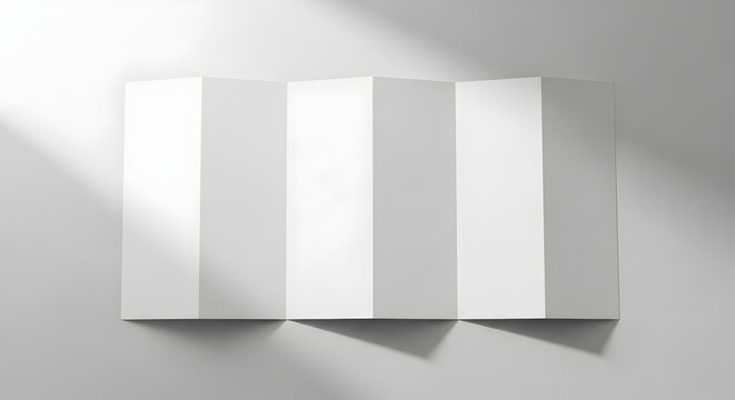 Minimalist white accordion fold mockup against light gray wall product presentation