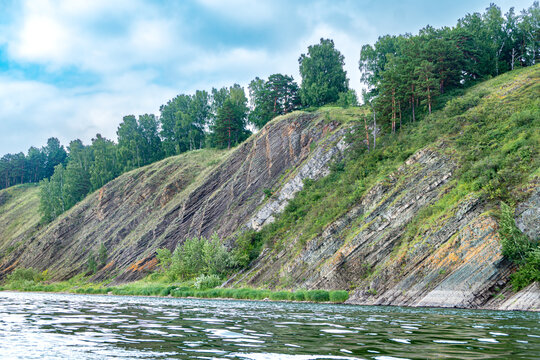 Steeply dipping limestone strata of the Verkhotomskaya Formation near Izvestkovy settlement famous for limestone quarrying