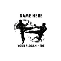 Obraz premium Two martial arts fighters sparring in dynamic pose