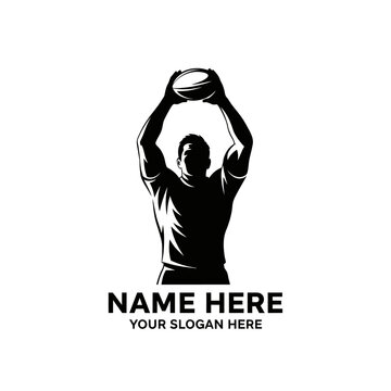 Rugby player holding ball above head for throw in