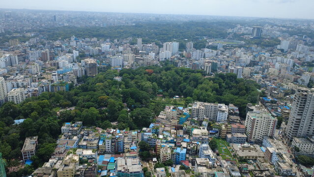 The aerial view of Chattogram city highlights the rapid urban expansion surrounding its remaining green hills and forests. Unplanned construction, hill cutting, and the destruction of trees.