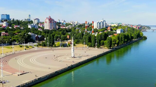 Voronezh, Russia. Admiralteyskaya Square and its white rostral column, Drone footage over the Voronezh River Embankment under bright summer sky. Drone footage, Point of interest