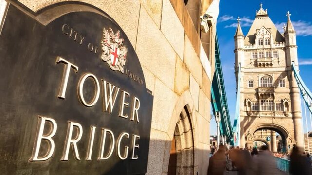 Tower Bridge in London, UK, United Kingdom. Time lapse. People walking.