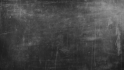 Chalk rubbed out on blackboard. Dark blackboard of Chalkboard texture background. © Sharmin