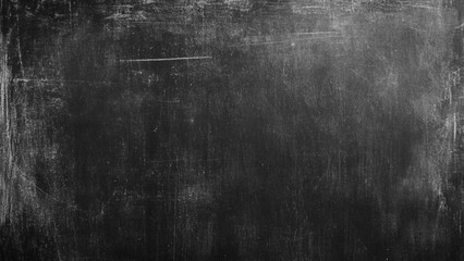 Chalk rubbed out on blackboard background.  © Sharmin