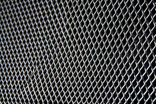 silver grey metal mesh background with diamond grid structure