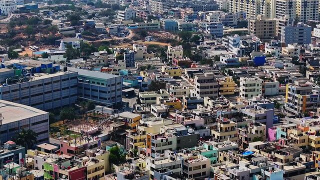 Hetero Labs UNIT-3 building with Residential buildings, apartments and Mallanna Temple at rajiv gandhi nagar, suraram, hyderabad, telangana, india. day time, push in shot, drone shot, 4k.