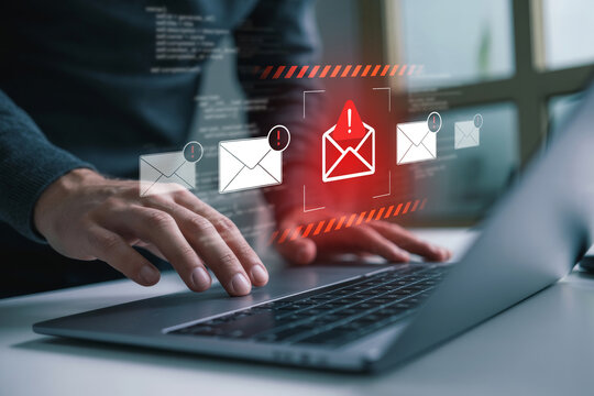 Cybersecurity risk and phishing scam concept with data breach alert on screen