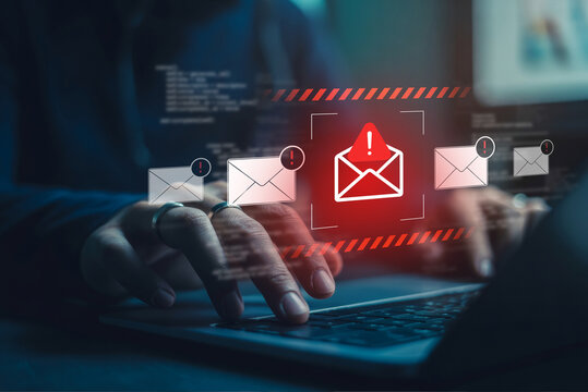 Cybersecurity risk and phishing scam concept with data breach alert on screen