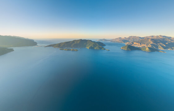 Marmaris, Turkey. Panoramic aerial view of empty bay without yachts, Cennet and Kechi Islands with Mediterranean Sea on horizon. Serene morning. Aerial view.
