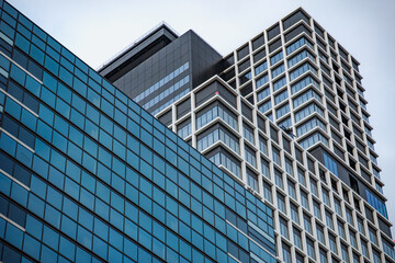 Obraz premium Contemporary urban buildings with geometric architecture