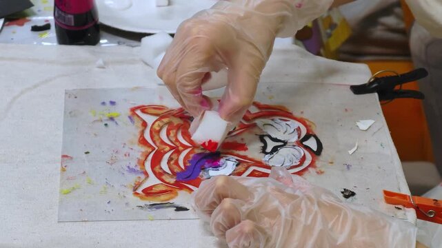 Stencil painting concept. Educational activity for children where they paint with colored paints. Creativity. 