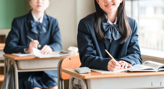 Middle school and elementary school students diligently studying in school classrooms and cram schools.