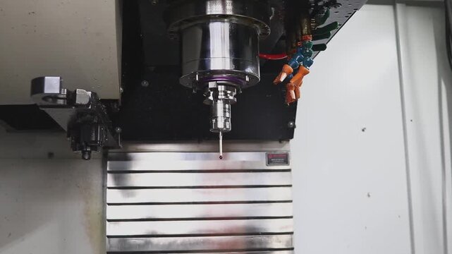 Modern CNC machine in training workshop for students during practical training in metalworking.