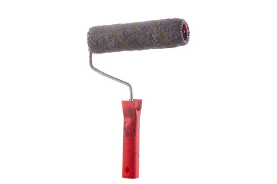 Red handle paint roller stands upright