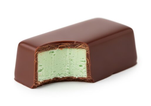 Chocolate covered mint candy with a bite taken out