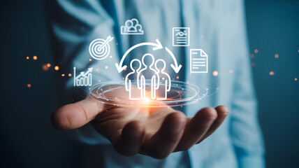 Obraz premium Human resources management concept with circular workflow and business icons above an open palm during a corporate presentation