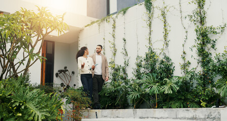 Naklejka premium Explain, realtor and view with client walking for home investment or property tour. Listing, mortgage and rental apartment with estate agent woman speaking to man outdoor for advice or consulting