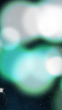 Vertical video: Blue node showing, bokeh moving, merging, drifting, glitch crossing, forming scene