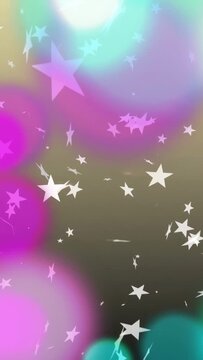 Vertical video: Bokeh fading and expanding, white star sprites growing and drifting, creating depth