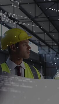Vertical video: Site engineer holding plans in hangar, AR markers appearing and guiding truss scan